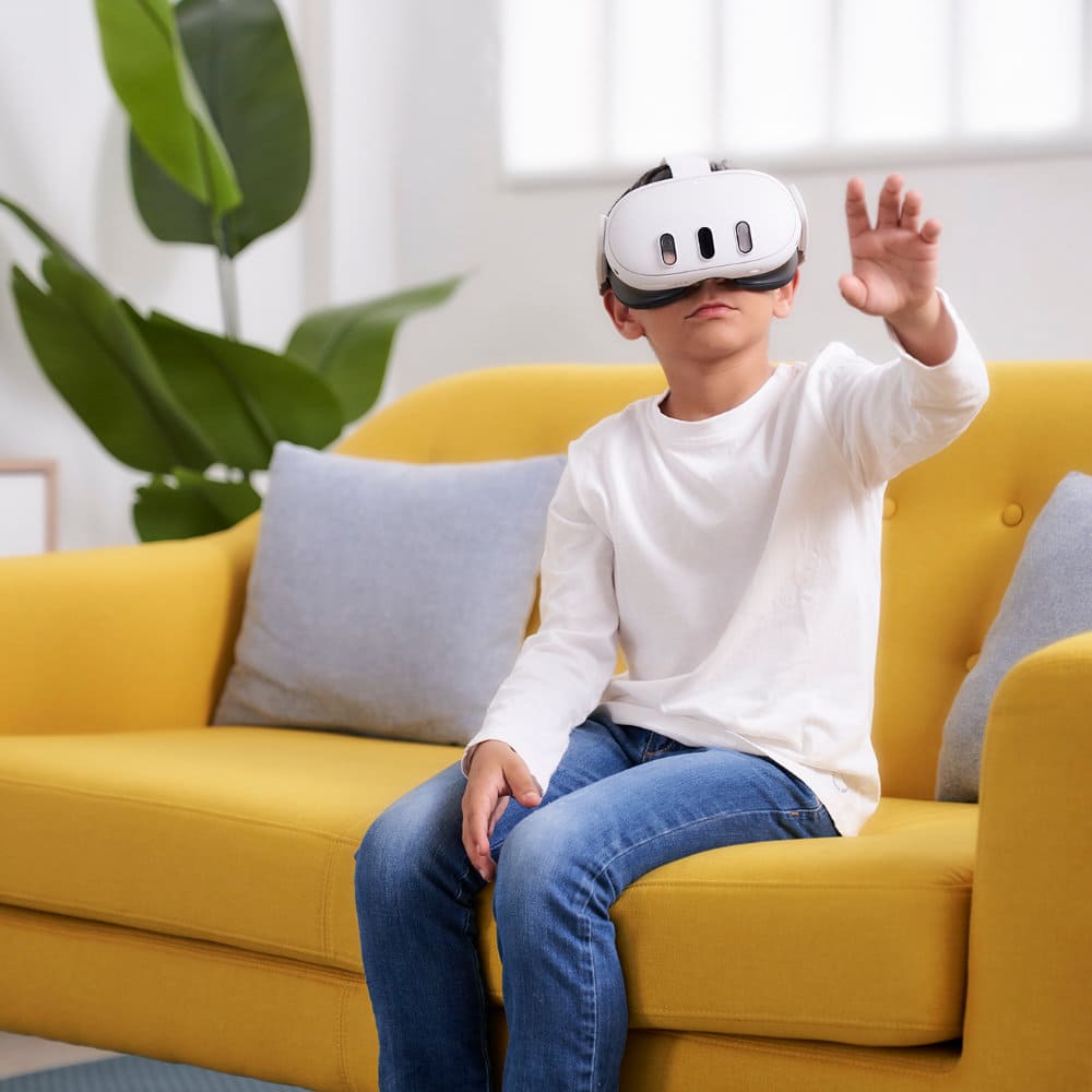 boy sitting in a room while practicing exposure therapy with virtual reality