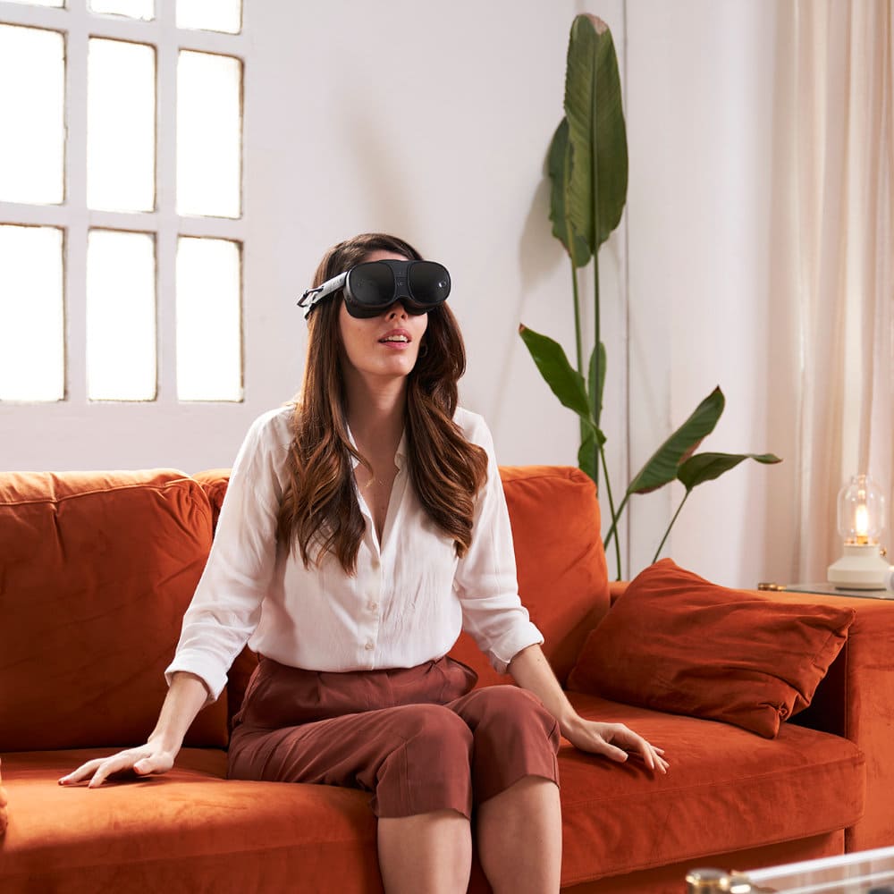 girl sitting in a room while practicing neurological virtual reality therapy